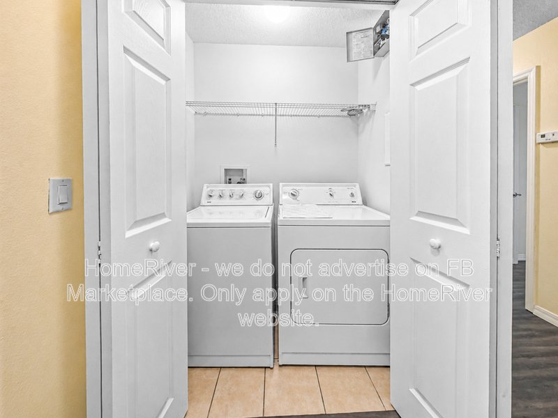 Townhome with a garage property image