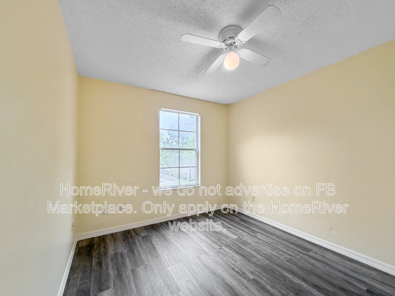 Townhome with a garage property image