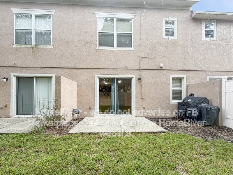 Townhome with a garage property image
