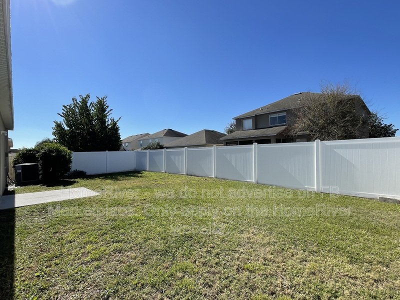 Updated 5 bedroom home with fenced yard and community pool property image