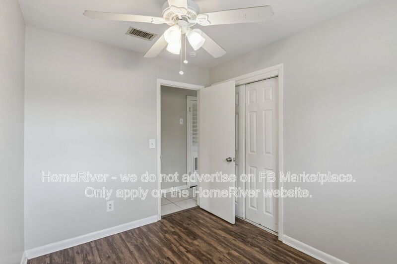 4 bedroom home with fenced yard property image