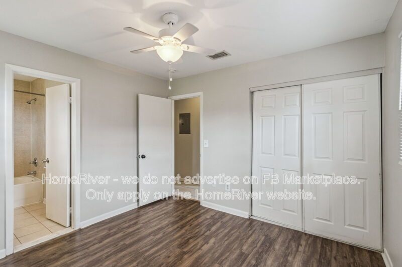 4 bedroom home with fenced yard property image