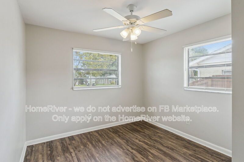 4 bedroom home with fenced yard property image