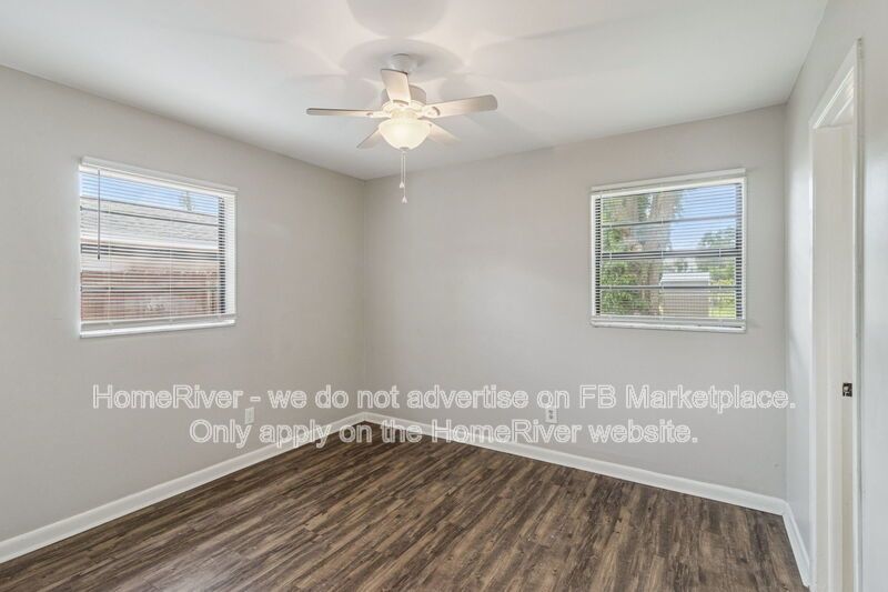 4 bedroom home with fenced yard property image
