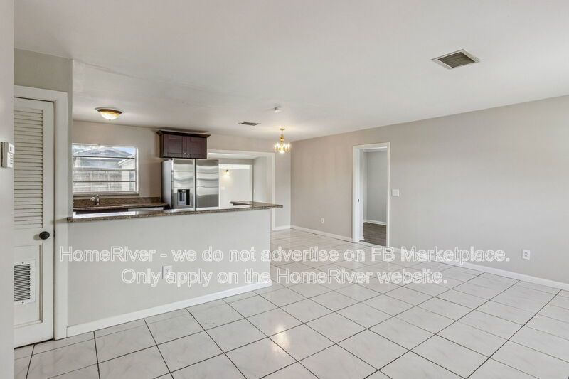 4 bedroom home with fenced yard property image