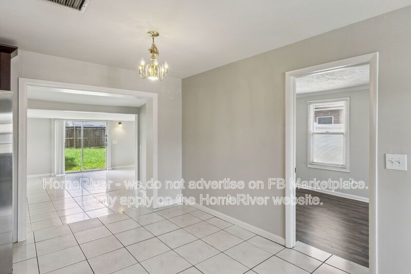 4 bedroom home with fenced yard property image