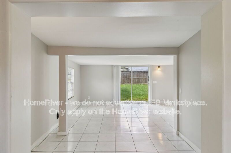 4 bedroom home with fenced yard property image